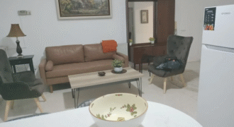One room in a two-bedroom apartment
